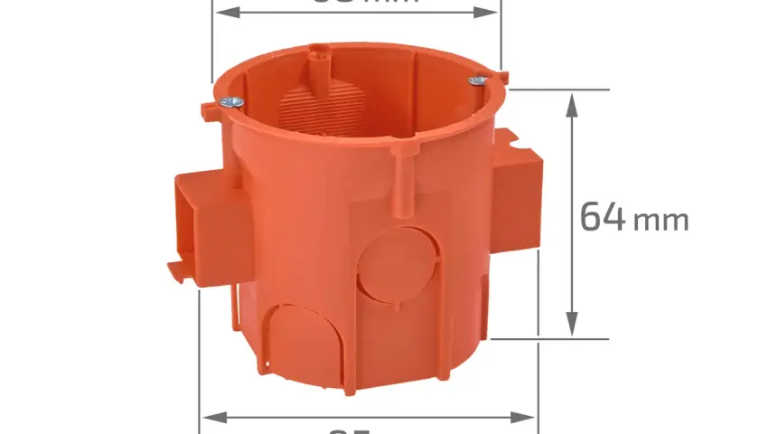 Pomarańczowa puszka elektryczna z zaznaczonymi wymiarami: średnica 68 mm, wysokość 64 mm, szerokość 85 mm.