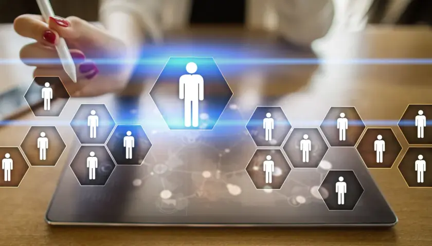 Interfaz digital para la gestión de personal, mostrando iconos de personas en hexágonos. La digitalización RRHH transforma la administración de talento.