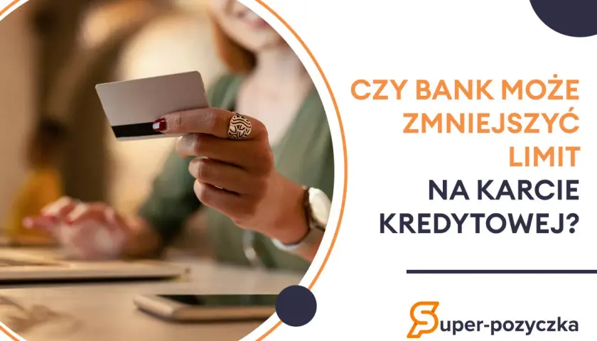 Kobieta trzyma kartę kredytową, zastanawiając się, czy bank może zmniejszyć limit.