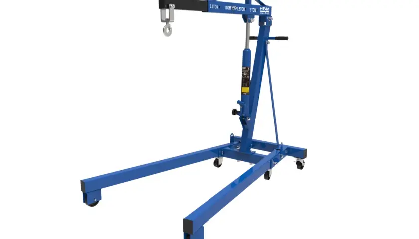 Blauer Werkstattkran 2t mit ausziehbarem Arm und Haken, bereit für schwere Hebearbeiten in der Werkstatt.