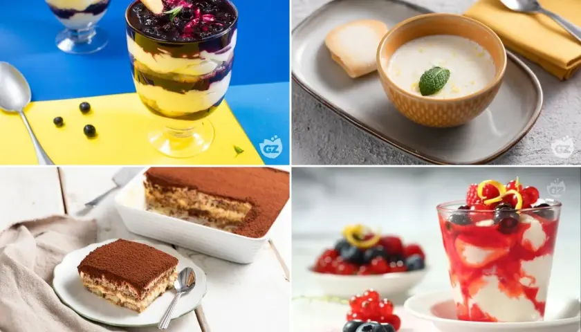 Varietà di dolci freddi: coppette con frutti di bosco, tiramisù e crema.