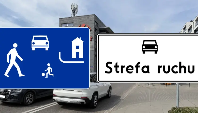 Znaki drogowe informują o wjeździe do strefy ruchu. Na niebieskim znaku widać pieszego, dziecko grające w piłkę i dom.
