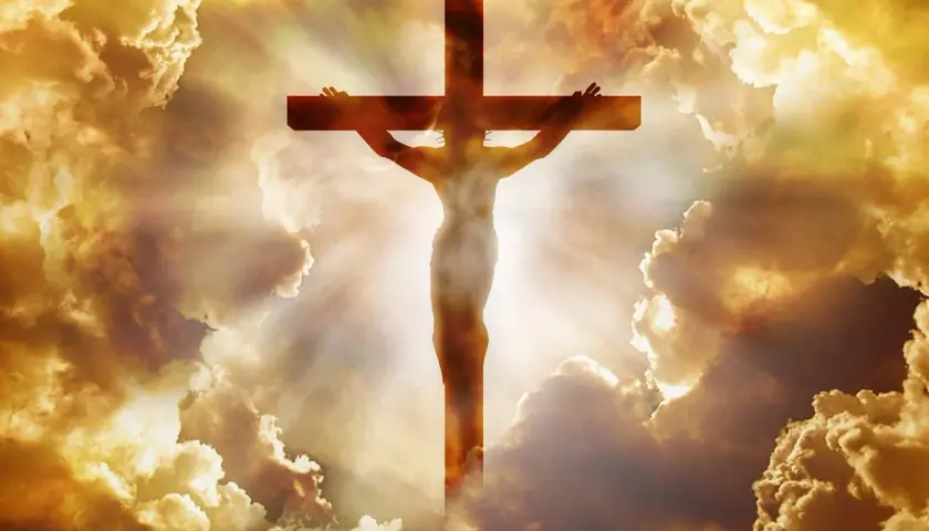 Christi Himmelfahrt: Jesus am Kreuz, umgeben von strahlenden Wolken. Ein biblisches Bild der Erlösung.