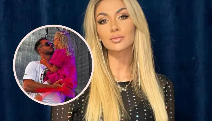 Kobieta z długimi blond włosami i mężczyzna trzymający dziecko. Czy to rodzina? Ile lat ma dziecko?