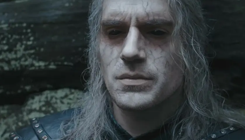 Geralt z Rivii, wiedźmin o siwych włosach i bliznach, wygląda na zmęczonego. Ile lat ma Geralt z Rivii? Trudno zgadnąć, jego wiek to tajemnica.