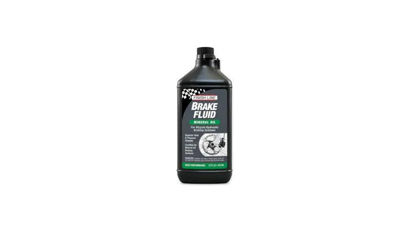 Finish Line Brake Fluid bottle, mineral oil for hydraulic systems. Its viscosity ensures superior heat and pressure stability for reliable braking.
