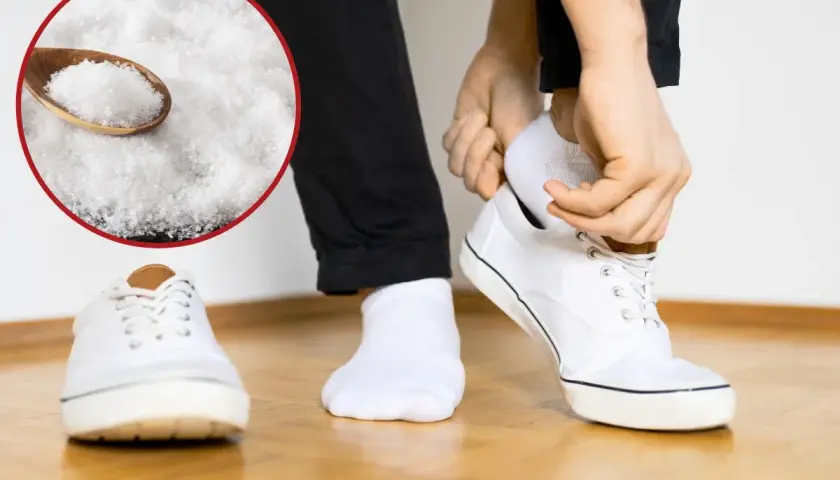 Łyżka sody oczyszczonej i białe trampki, osoba zakłada białą skarpetkę.