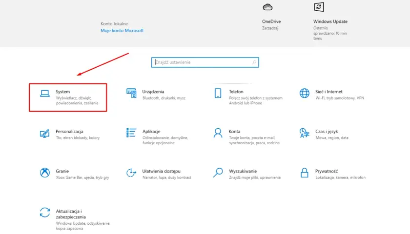 Ustawienia systemu na ekranie laptopa. Sekcja "System" obejmuje wyświetlacz, dźwięk, powiadomienia i zasilanie.