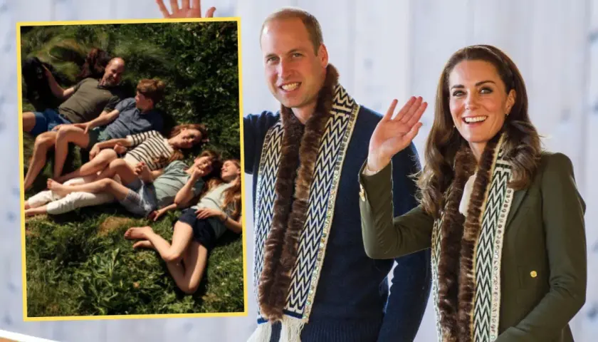 Kate i William z dziećmi odpoczywają na trawie. Książę i księżna pozdrawiają, ubrani w ozdobne szale.