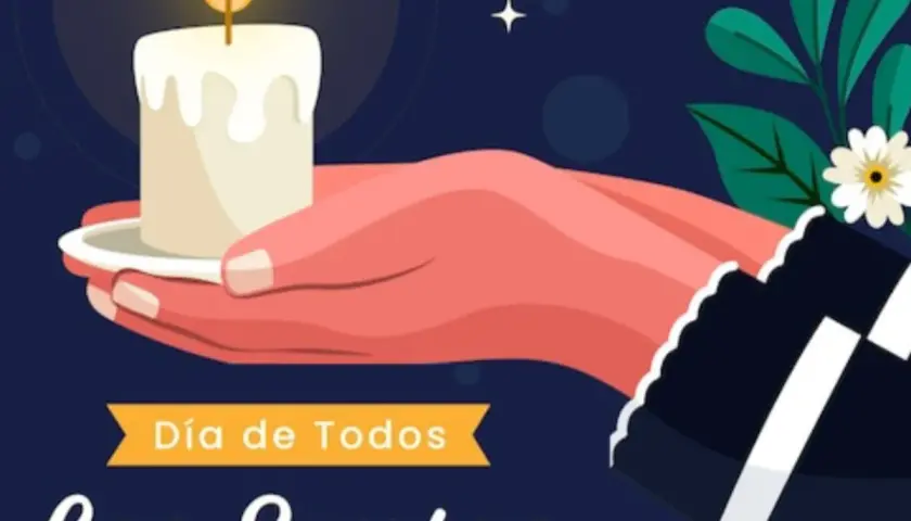 Una mano sostiene una vela encendida, símbolo de recuerdo para el Día de Todos los Santos. Frases para honrar a los difuntos.