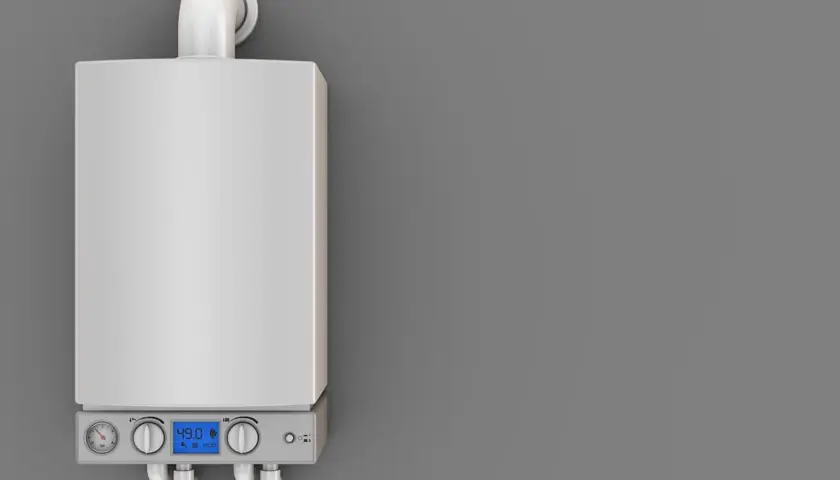 Nowoczesny piec gazowy z wyświetlaczem wskazującym temperaturę 49°C. Urządzenie pracuje w trybie eco, co sugeruje efektywne wykorzystanie energii i minimalizację kondensacji w piecu gazowym.
