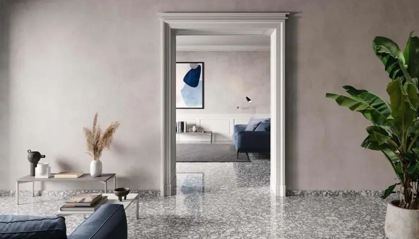 Gres porcellanato sottile: pro e contro di un pavimento moderno. Un soggiorno elegante con un tocco di design.