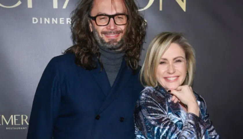 Małgorzata Ohme z partnerem na tle napisu "CHATEAU DINNER".