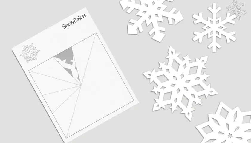 Schneeflocke vorlage einfach zum Ausschneiden. Papier gefaltet, bereit für den Schnitt. Mehrere fertige Schneeflocken liegen daneben.