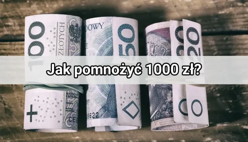 Zrolowane banknoty 100 zł i 50 zł na drewnianym tle. Pytanie brzmi: "Jak pomnożyć 1000 zł?".