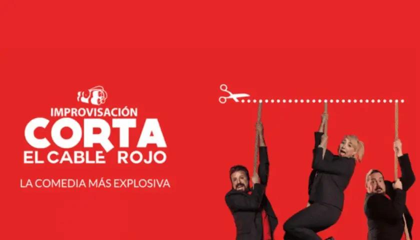 Improvisación "Corta el cable rojo" en Valencia. Tres actores cuelgan de cuerdas, uno a punto de ser cortado.