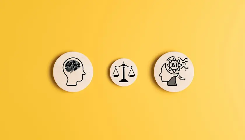 Trzy drewniane krążki na żółtym tle: ludzki mózg, waga sprawiedliwości i głowa z symbolem AI w środku, ilustrują, jak sztuczna inteligencja może rozwiązać dylematy etyczne.