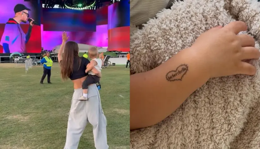 Dziecko z tatuażem "Bieberchella" na ręce, obok kobieta z dzieckiem na koncercie.