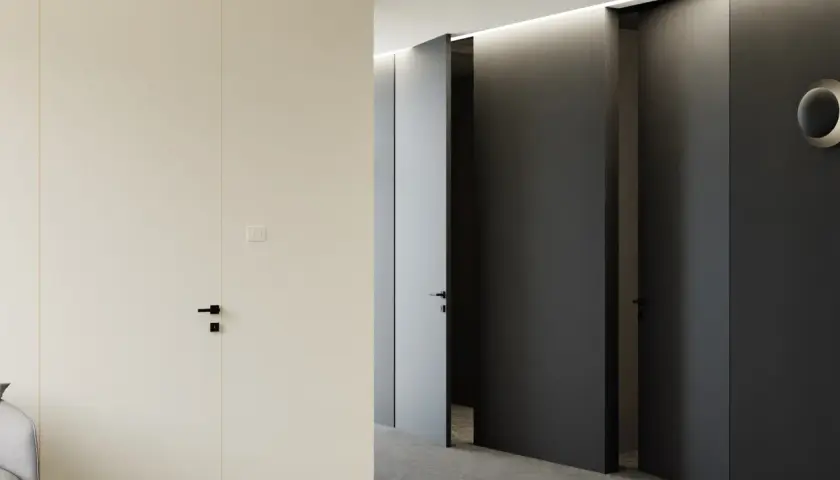 Nowoczesny korytarz z drzwiami ukrytymi w ścianie, tworzącymi efekt odwrotnej przylgi. Minimalistyczne wnętrze z subtelnym oświetleniem.