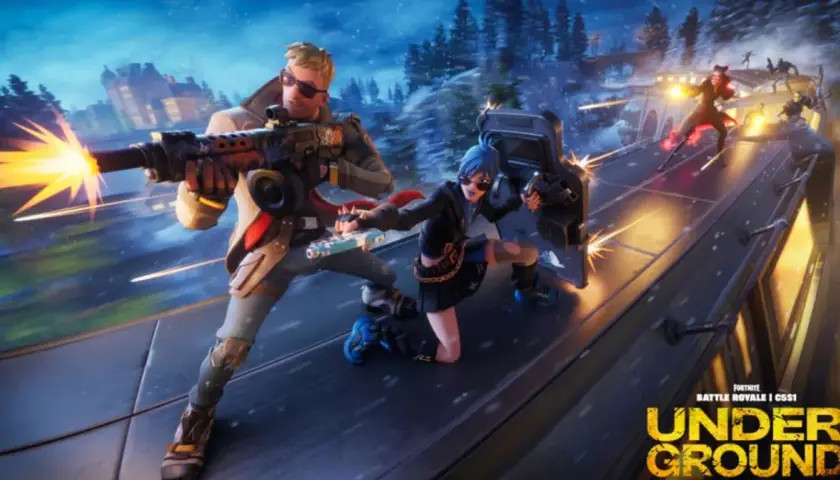 Żniwiarz Fortnite i jego towarzyszka bronią na dachu pociągu, w śnieżnej scenerii.