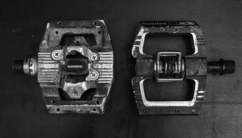 Shimano SPD pedal vs. Crank Brothers Mallet pedal, a classic showdown for mountain bikers.