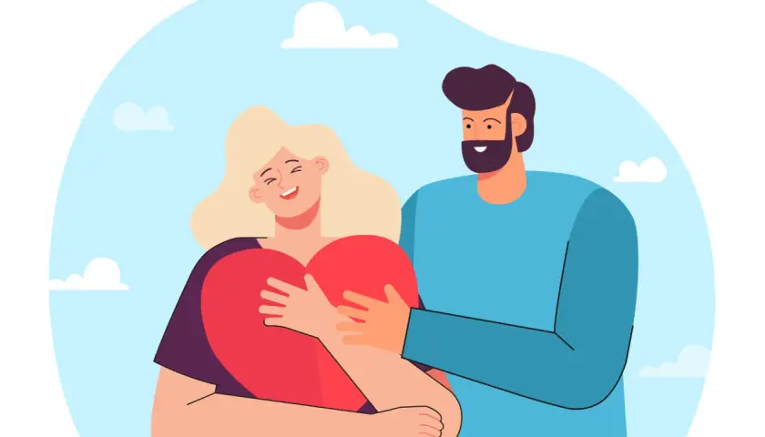 Coppia felice che si abbraccia con un grande cuore rosso. Lei sorride, lui la stringe. Ho bisogno di amore, e questo è un abbraccio pieno di esso.