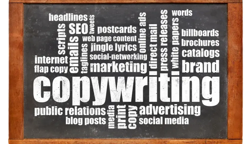 Tablica z napisem "COPYWRITING" otoczona słowami kluczowymi, takimi jak "marketing", "SEO", "social media", "blog posts", "press releases", "billboards", "brochures", "catalogs", "headlines", "tweets", "scripts", "emails", "web page content", "jingle l...
