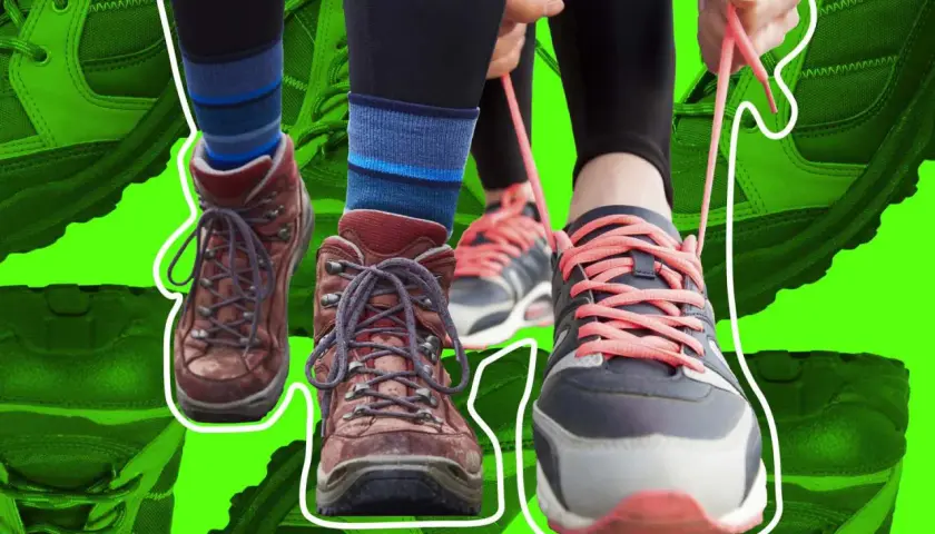 Comparing approach vs hiking shoes. One pair is sturdy, brown hiking boots, the other is a modern, grey and pink sneaker being laced up.