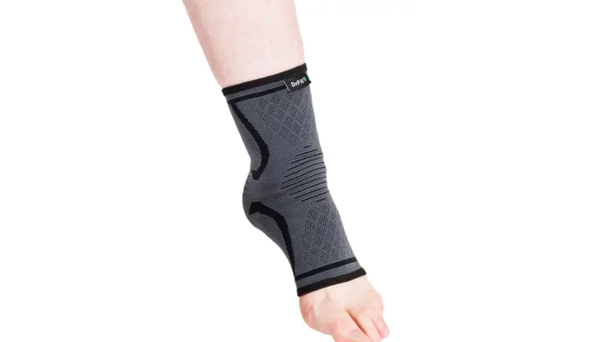 Szary stabilizator stawu skokowego DrFit, zapewniający wsparcie i ochronę.