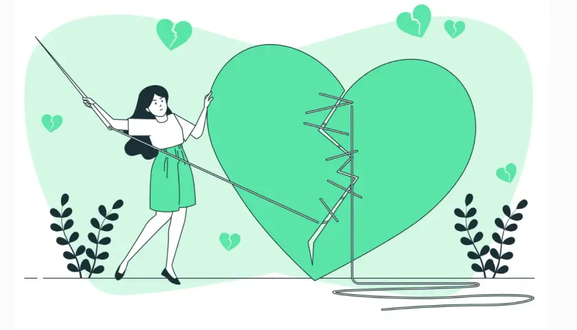 Una donna cuce un cuore spezzato, un simbolo di guarigione dopo relazioni difficili. Impara a riconoscere un narcisista per proteggerti.