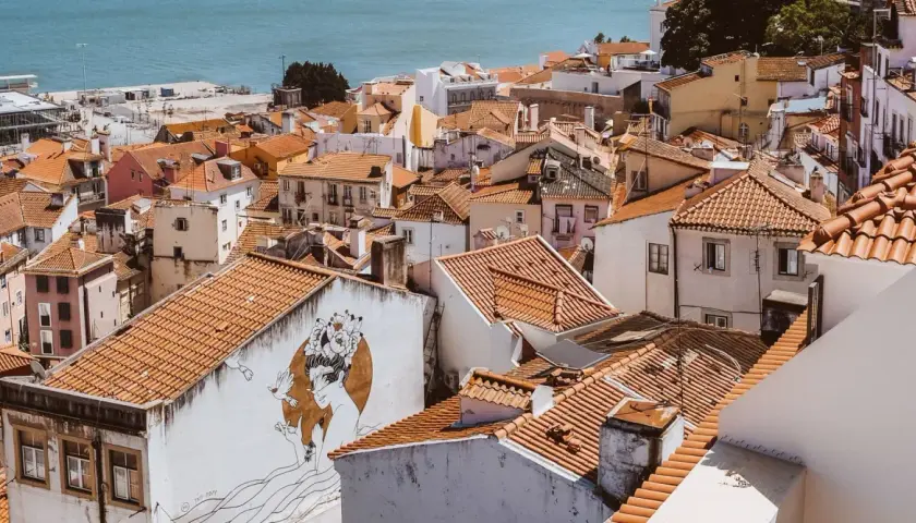 Alfama, Lisbon, is a charming, historic district with narrow streets and colorful buildings. It's generally considered safe for tourists.