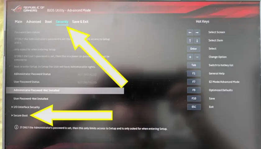 Menu BIOS z opcją "Secure Boot" zaznaczoną strzałką. Ustawienia bezpieczeństwa systemu.