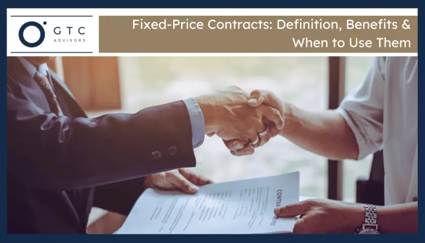 Two businessmen shake hands over a contract, signifying a firm fixed contract agreement.