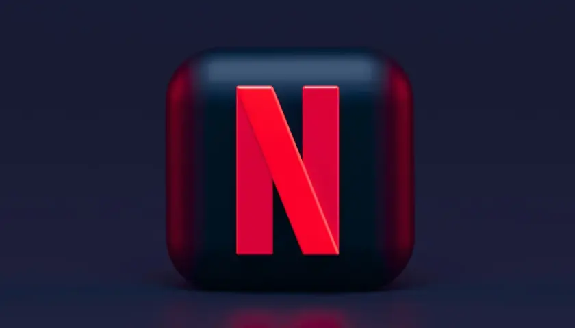 Czerwone logo Netflix na ciemnym tle. Niestety, Netflix nie działa, więc nie obejrzysz ulubionego serialu.