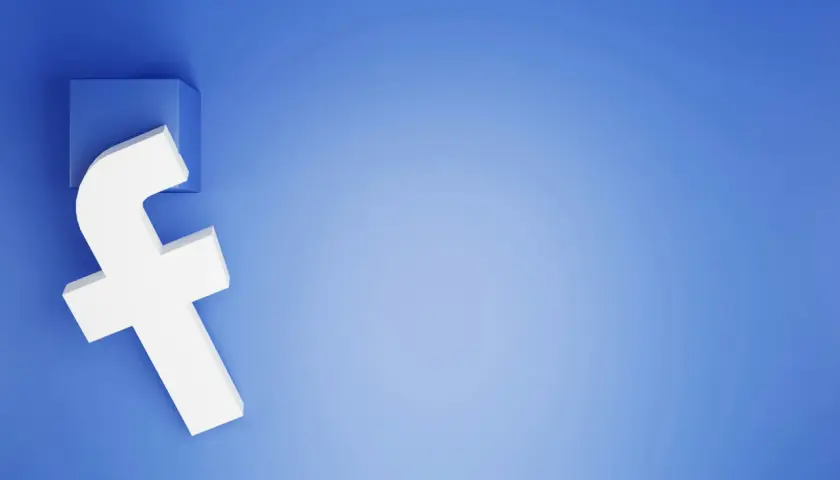 Biała litera "f" na niebieskim tle, symbolizuje Facebooka. Dowiedz się, jak odzyskać konto na FB, gdy je stracisz.