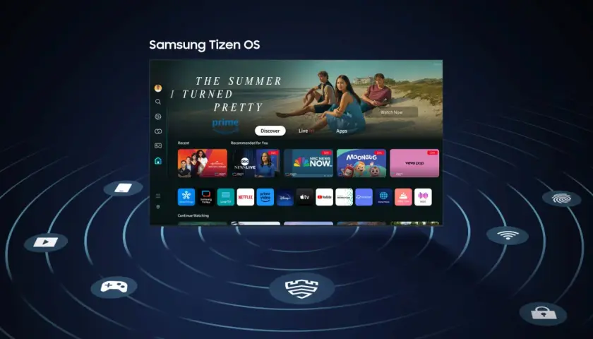 Interfejs Tizen OS na telewizorze Samsung. Widok ekranu głównego z rekomendacjami, aplikacjami i opcją "Kontynuuj oglądanie".