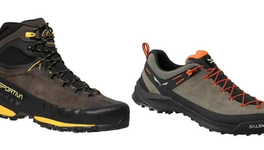 Dwa buty outdoorowe: wysoki brązowy La Sportiva i niski zielony Salewa.