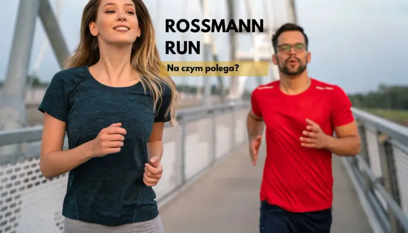 Uśmiechnięta kobieta i mężczyzna w okularach biegną na moście. Napis "ROSSMANN RUN" sugeruje wydarzenie sportowe.