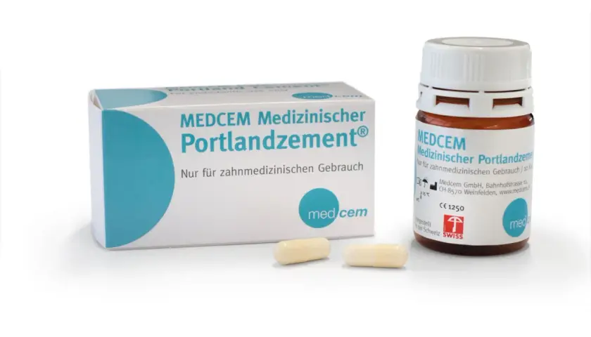MEDCEM Medizinischer Portlandzement: ein zahnmedizinisches Produkt, das in einer Schachtel und einem Fläschchen mit Kapseln präsentiert wird.