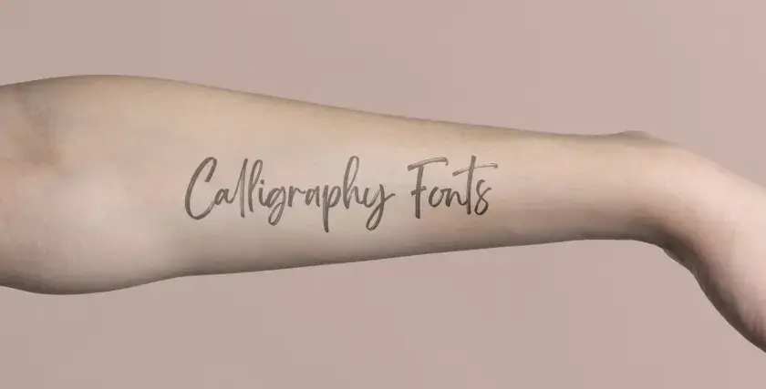 Delikatna kaligrafia tatuaz na ramieniu, napis "Calligraphy Fonts" w stylu pisanki.