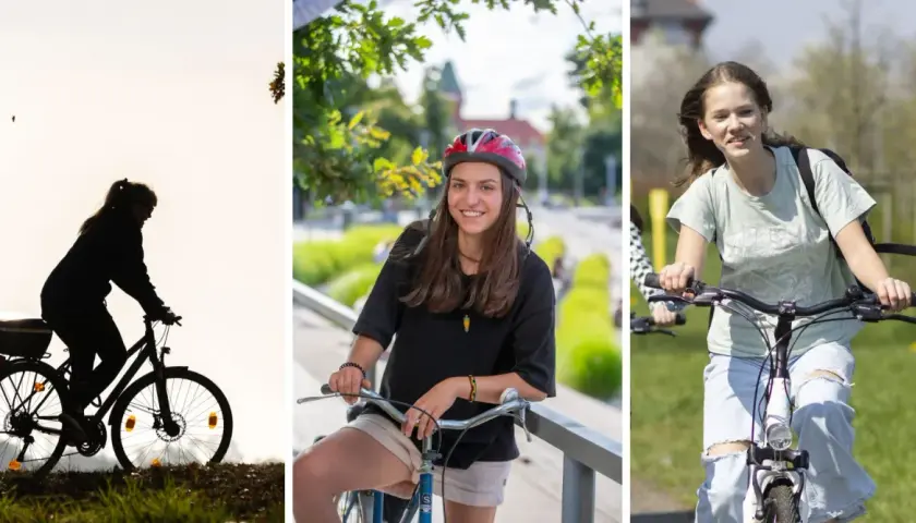 Trzy kobiety cieszą się jazdą na rowerze po Wrocławiu. Jedna z nich, w kasku, uśmiecha się do aparatu.