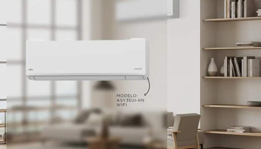 Un aire acondicionado split Fujitsu AIRSTAGE, uno de los tipos de aire acondicionado, modelo ASY35UI-KN con WiFi, en un salón moderno.