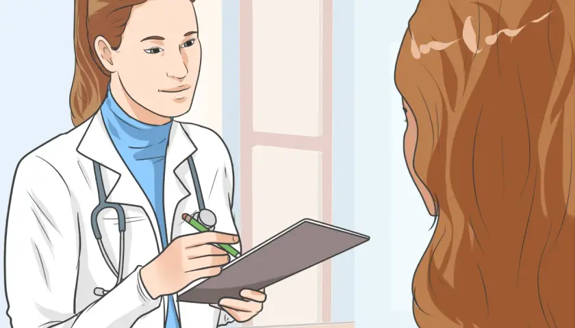 Medico con stetoscopio e appunti spiega a paziente come aumentare ossigeno nel sangue.
