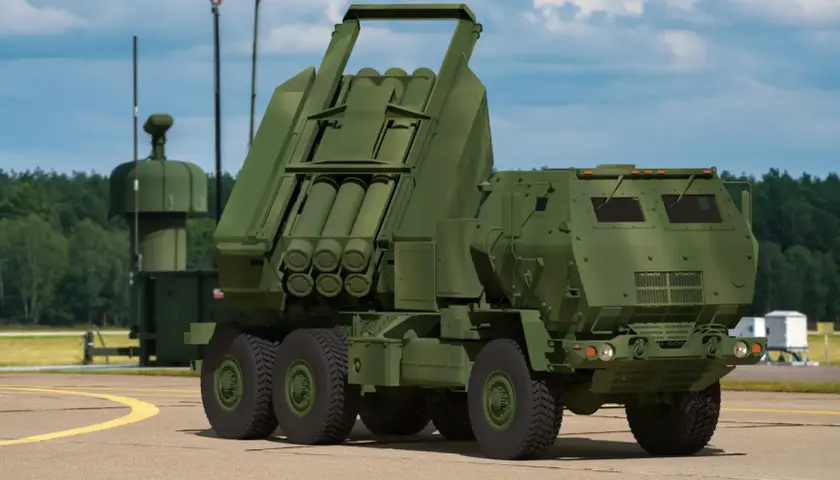 M142 HIMARS, potężna wyrzutnia rakietowa, gotowa do akcji na lotnisku.