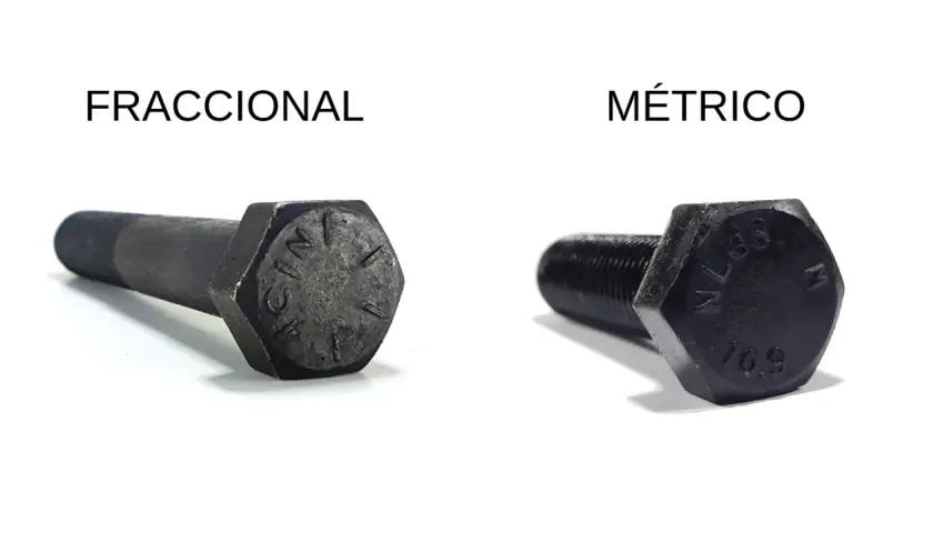Dos tornillos, uno fraccional y otro métrico, muestran la dureza de sus materiales.