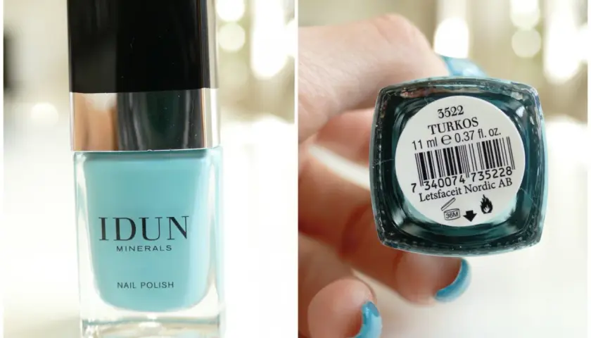 En flaska IDUN Minerals nagellack i färgen turkos. En hand med matchande turkos nagellack håller flaskans undersida.