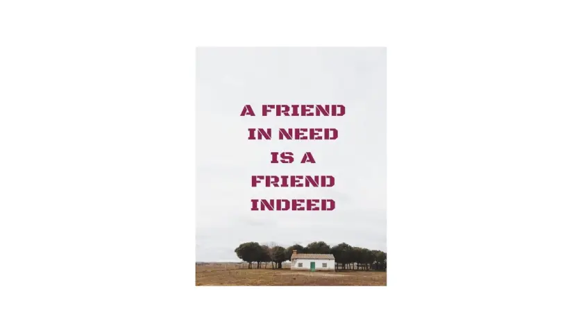 Samotny domek wśród drzew, z napisem "A friend in need is a friend indeed".