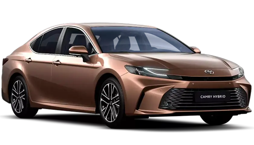 Elegancka, miedziana Toyota Camry Hybrid z nowoczesnymi światłami LED i czarnymi felgami.