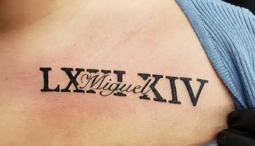 Tatuaż cyfry rzymskie LXIII i XIV z imieniem Miguel. Eleganckie wzory na skórze.