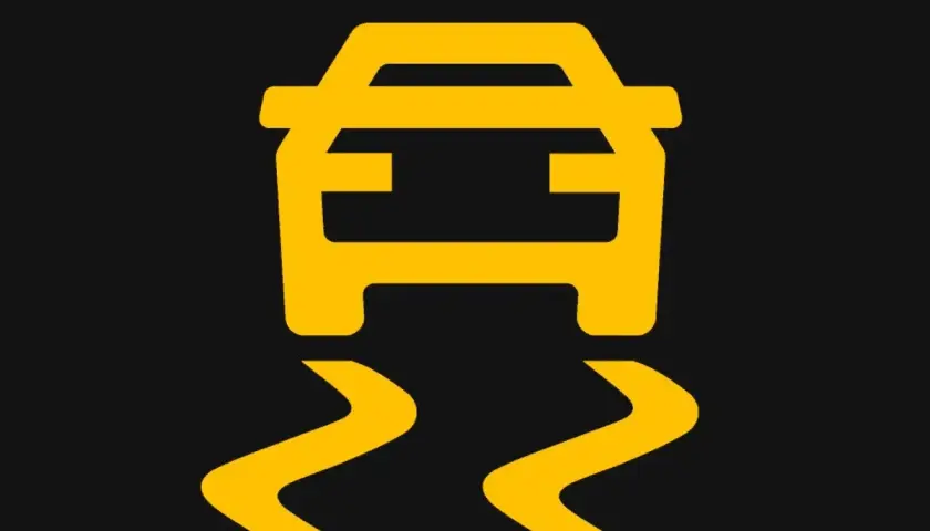 Voyant ESP allumé, signalant une perte d'adhérence. Attention, la route est glissante !